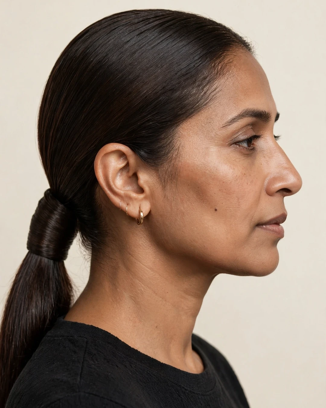 Sleek Low Ponytail with a Wrapped Base